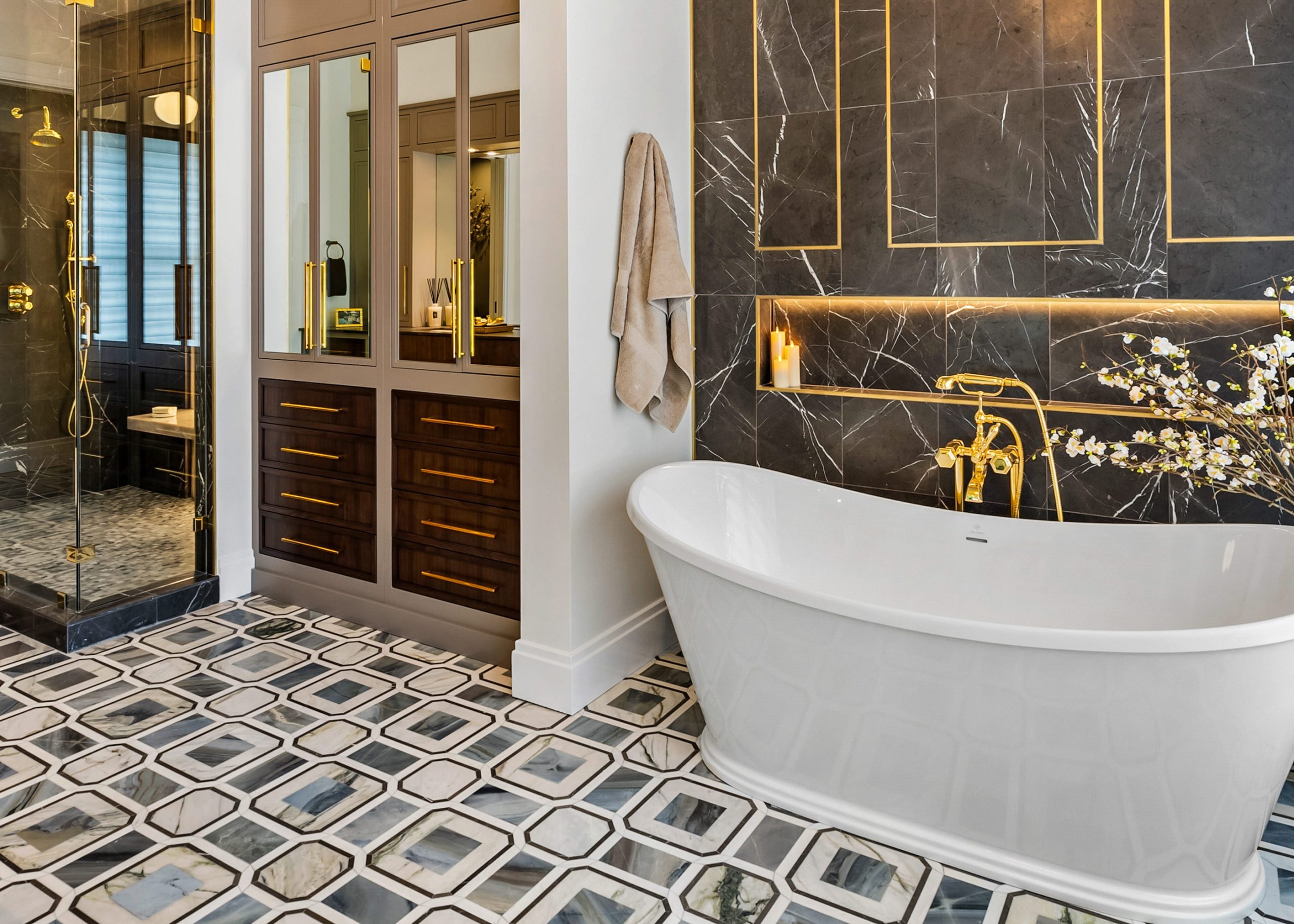 Restorative bathroom retreat with marble details and brass fixtures